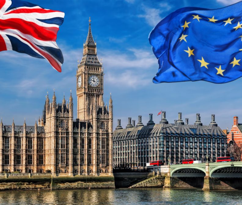 European Union and British Union flag flying against Big Ben in London, England, UK, Stay or leave, Brexit